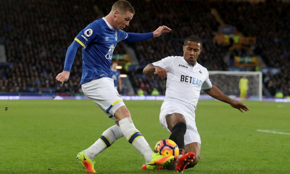 James McCarthy and Wayne Routledge battle for the ball in a match which left both sides with bittersweet emotions.