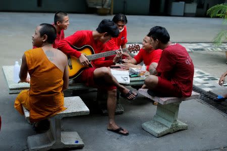 Patients play music at the rehabilitation and detox program at Wat Thamkrabok monastery in Saraburi province, Thailand, February 7, 2017. REUTERS/Jorge Silva