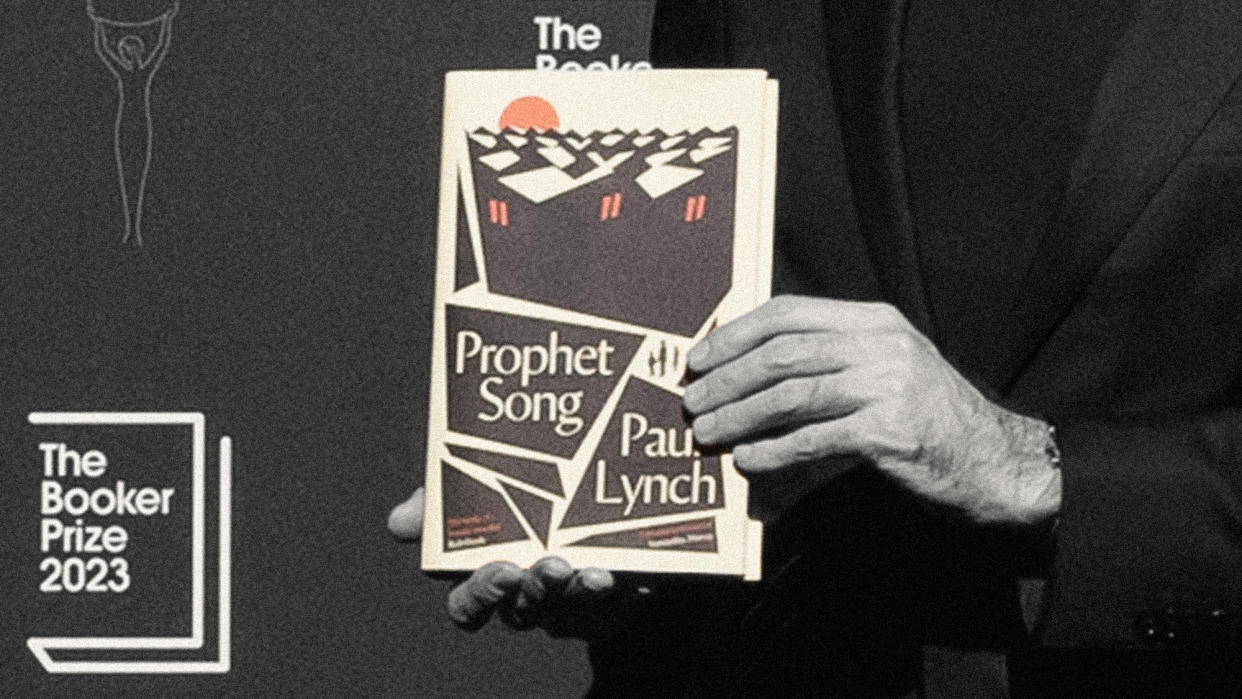  A closeup of Paul Lynch's hands holding up his book, "Prophet song", at the Booker Prize awards 2023. 