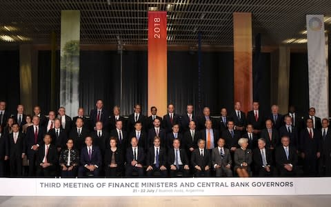 G20 finance ministers pose for their "family portrait" - Credit: Eitan Abramovich/AFP