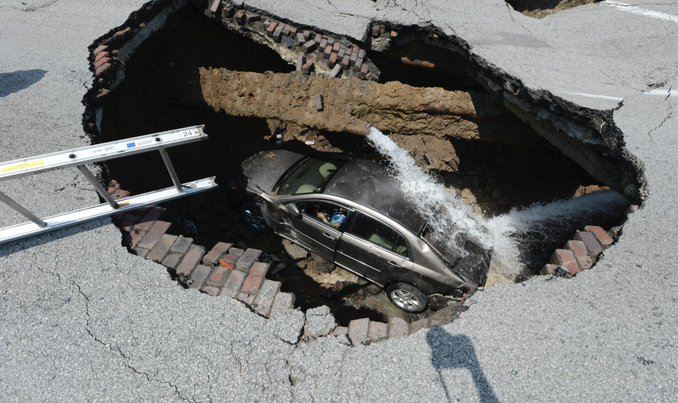 Sinkholes, like this one in Ohio, can be caused by shoddy construction. (Photo: REUTERS/Lt. Matthew Hertzfeld/Toledo Fire)