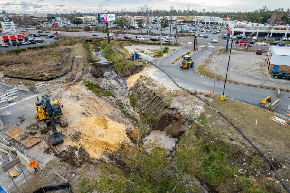 Work started Feb. 7 on the West 23rd Street Plaza intersection where two concrete culvert sections were installed. In September 2020, the road collapsed during Hurricane Sally.