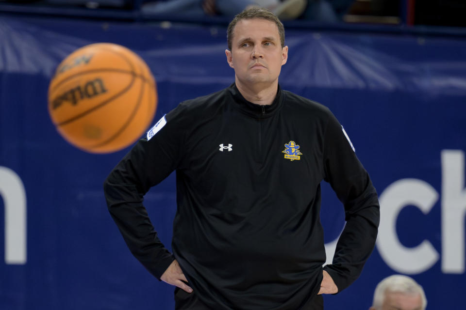 McNeese State coach Will Wade watches the team's NCAA college basketball game against New Orleans in New Orleans, Wednesday, March 6, 2024. Wade was suspended for the first 10 games of the 2023–24 season by the NCAA but the team went to a 28-3 record and finished first in the Southland Conference. (AP Photo/Matthew Hinton)