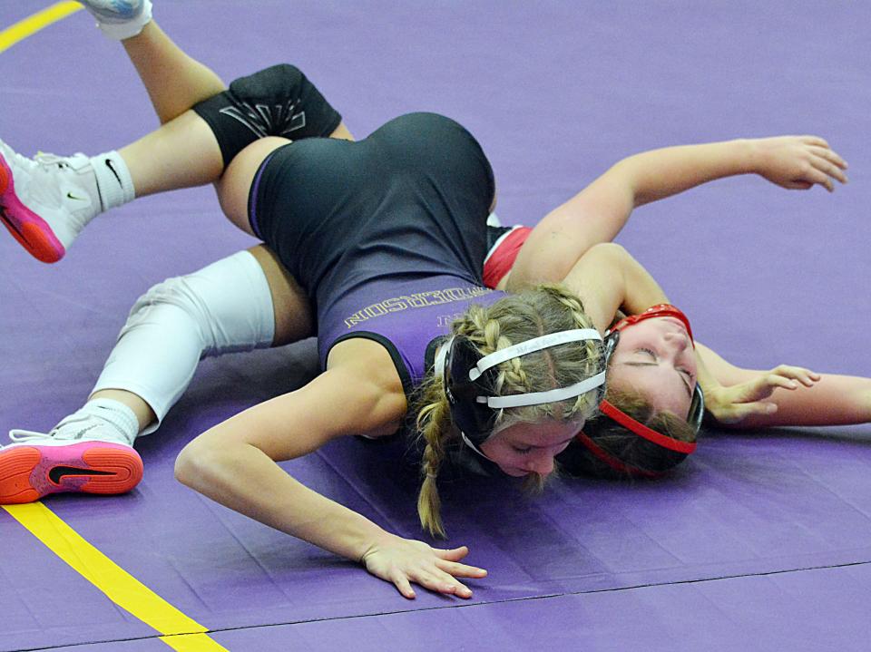 Watertown's Olivia Anderson puts Brookings' Claire Milliron on her back at 100 pounds during an Eastern South Dakota Conference girls wrestling dual on Thursday, Dec. 14, 2023 in the Civic Arena.