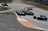 Red Bull driver Max Verstappen of the Netherlands leads at the start of the Formula One Dutch Grand Prix, at the Zandvoort racetrack, Netherlands, Sunday, Sept. 5, 2021. (AP Photo/Peter Dejong)