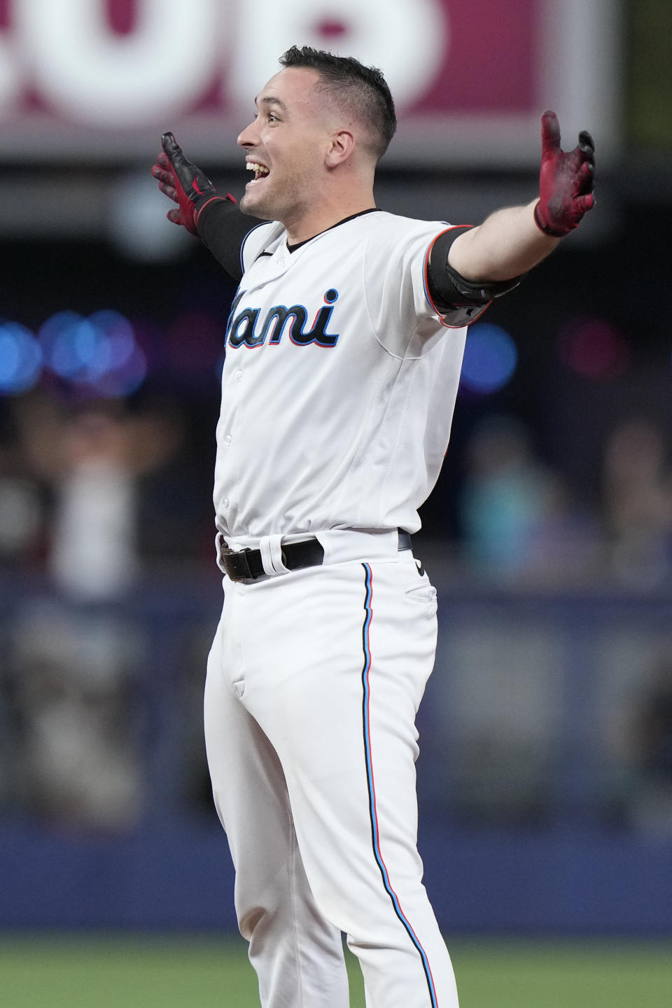 Miami Marlins' Nick Fortes reacts after hitting in the game-winning run during the ninth inning of a baseball game against the San Diego Padres, Wednesday, May 31, 2023, in Miami. (AP Photo/Wilfredo Lee)