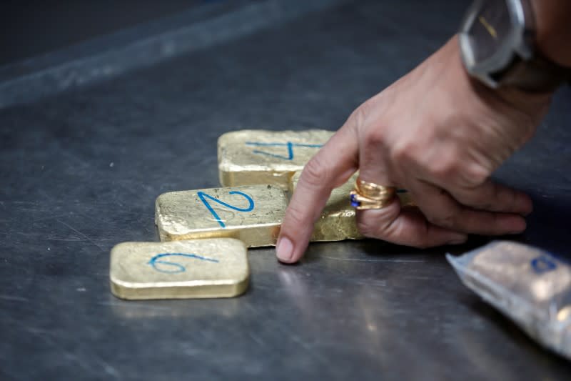 Gold bars are seen before the refining process at AGR (African Gold Refinery) in Entebbe