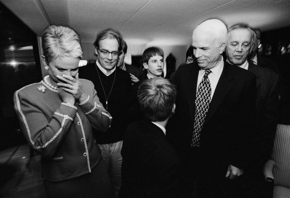 <p>Presidential candidate John McCain with his family and members of his campaign team, including his wife Cindy McCain, left and political adviser Mike Murphy, second from left, after winning the state primary, Feb. 1, 2000, in N.H. (Photo: David Hume Kennerly/Getty Images) </p>