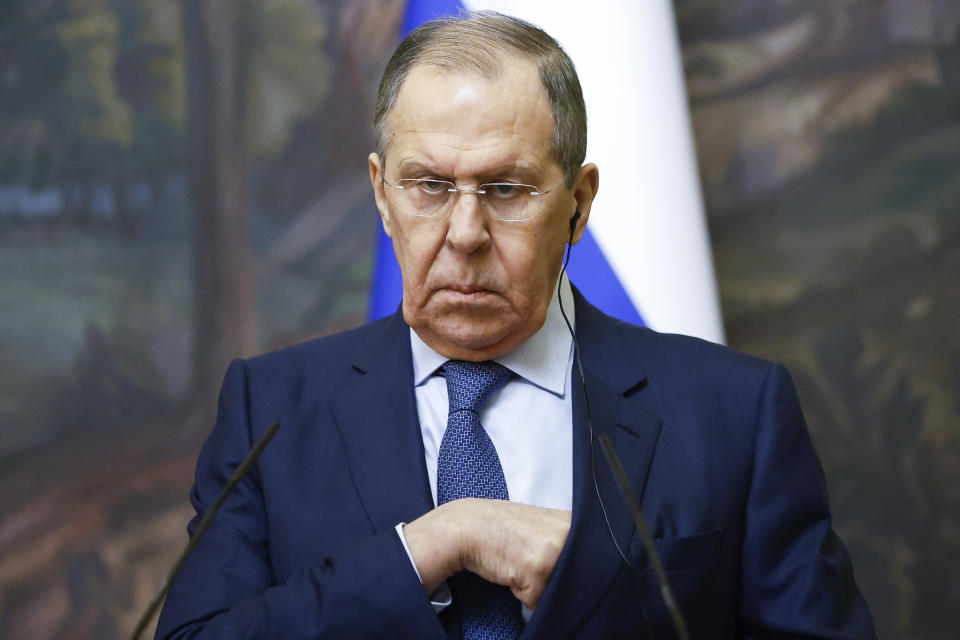 Russian Foreign Minister Sergey Lavrov attends a joint news conference with Greek Foreign Minister Nikos Dendias following their talks in Moscow, Russia, Friday, Feb. 18, 2022. (Maxim Shemetov/Pool Photo via AP)