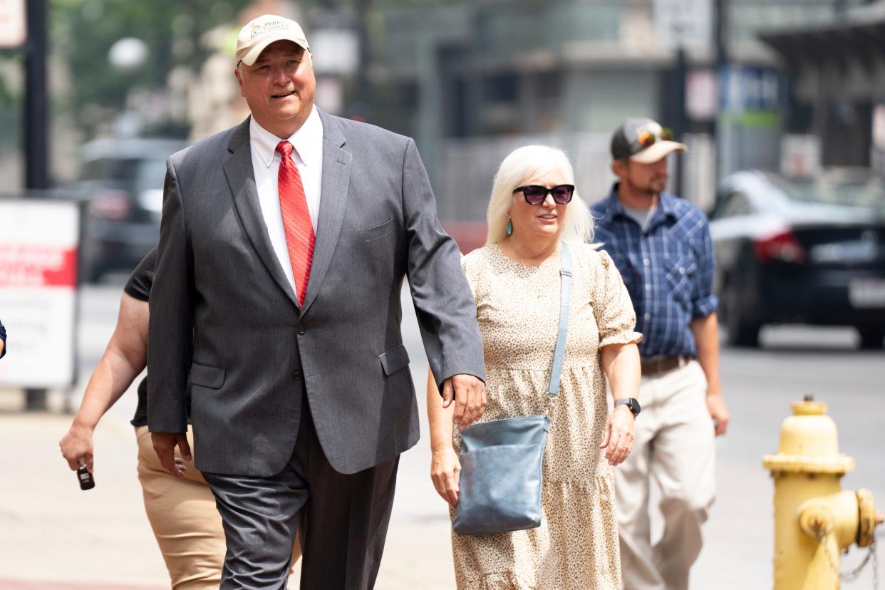 Ex-Ohio House Speaker Larry Householder walks into the Potter Stewart Federal Courthouse in Cincinnati where he is being sentenced after being convicted of corruption charges on Thursday