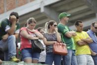 <p>Fans of Brazil’s soccer team Chapecoense gather at the Arena Conda stadium in Chapeco, Brazil, Tuesday, Nov. 29, 2016. A chartered plane that was carrying the Brazilian soccer team to the biggest match of its history crashed into a Colombian hillside and broke into pieces, killing 75 people and leaving six survivors, Colombian officials said Tuesday. (AP Photo/Andre Penner) </p>