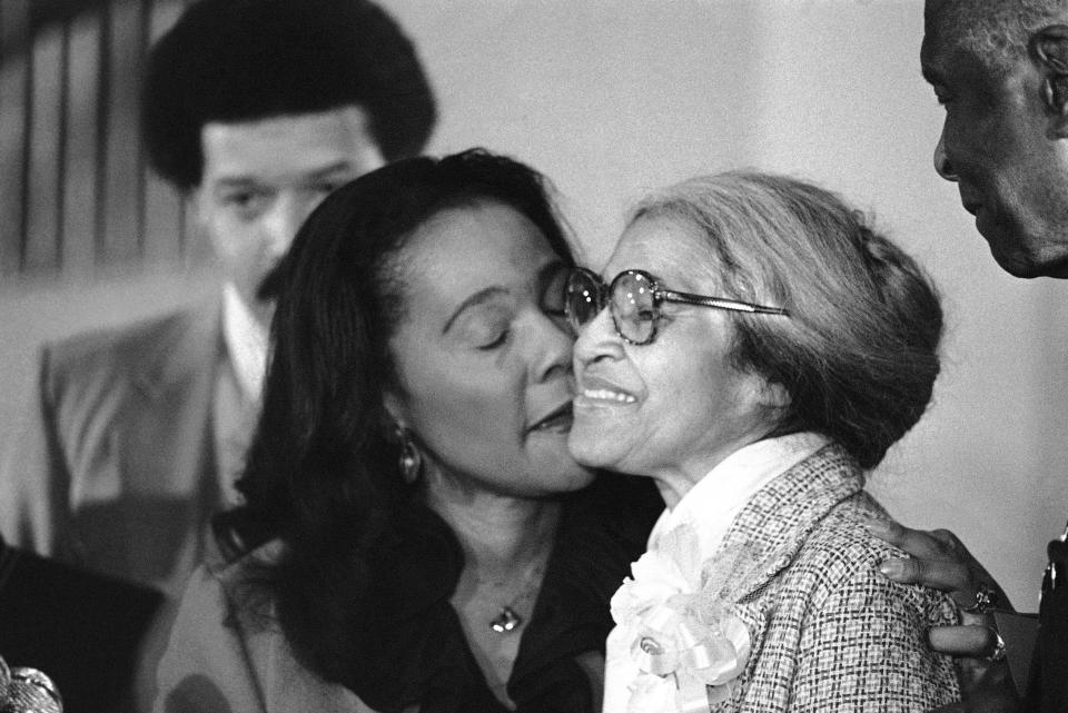 Rosa Parks, right, is kissed by Coretta Scott King, as she received the Martin Luther King, Jr. Non-violent Peace Prize in Atlanta, Jan. 14, 1980. Parks, who refused to give up her seat on a Montgomery, Ala., bus nearly 25 years ago, is the first woman to win the award. (AP Photo)