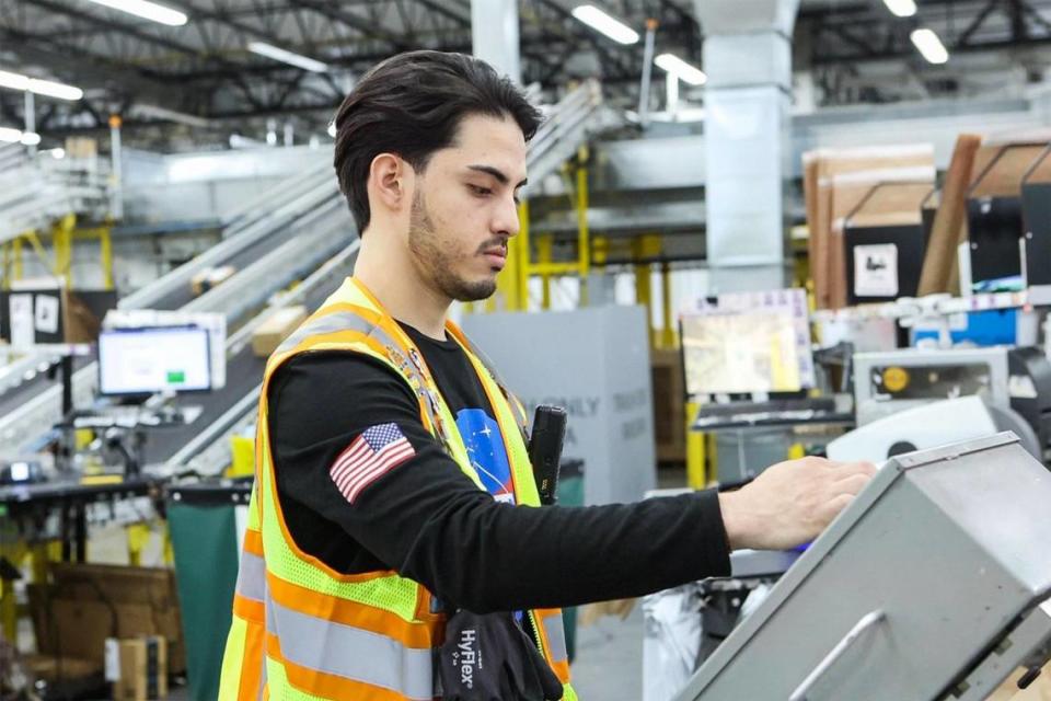 Juan “CJ” Colorado is a production assistant manager at an Amazon warehouse. “Let’s say you order something on Amazon. It gets picked, sent over here to this department, and the packer will be in charge of packing each item in the proper box,” Colorado explained. “It’s a very friendly system and very easy to use.”