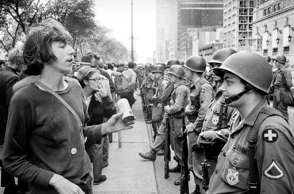 National Guard soldiers come up against protesters outside the Democratic National Convention in Illinois in 1968 (Alamy)