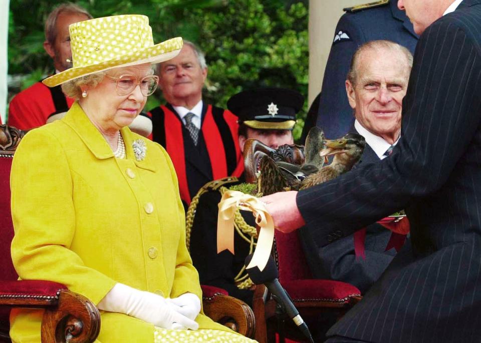 Queen Elizabeth II presented two dead female mallards on a silver platter in an act of homage by Steve Morgan, Seigneur of the Parish of Trinity on the island of Jersey. (Fiona Hanson/PA Wire)