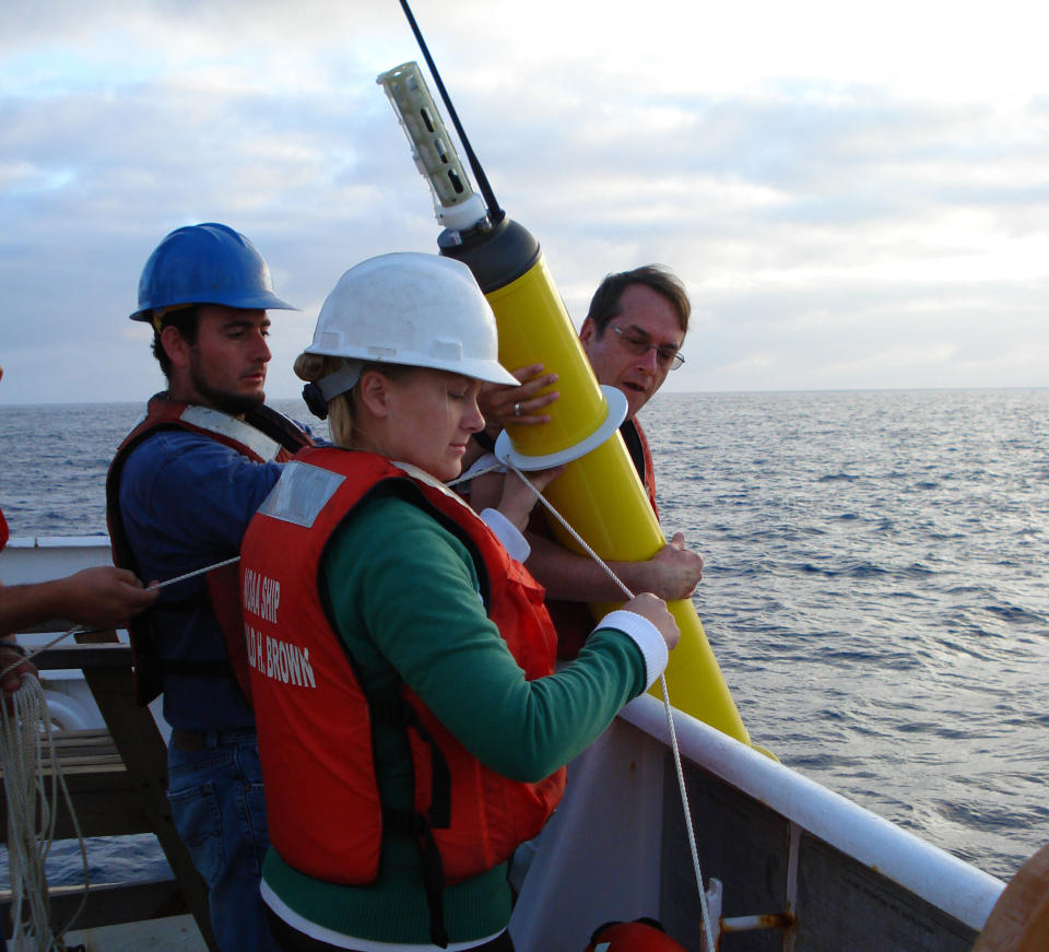 This photo provided by NOAA Corps shows an Argo float being deployed to capture ocean temperature data. (Photo: Lt. Elizabeth Crapo/National Oceanic and Atmospheric Administration via Associated Press)