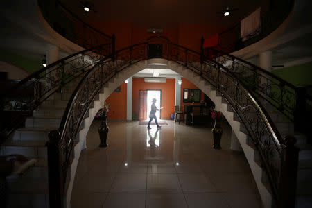 Emily Hernandez is seen in her house in Intipuca, El Salvador, August 14, 2018. REUTERS/Jose Cabezas