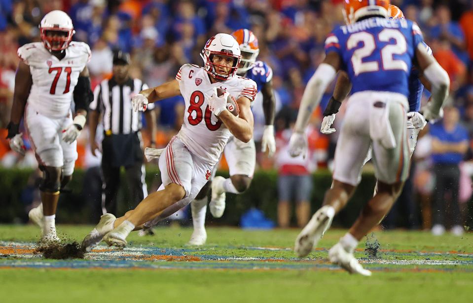 Utah tight end Brant Kuithe heads up field during game against Florida play in Gainesville, Fla., on Saturday, Sept. 3, 2022.