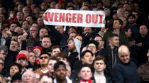 <p>A fan holds up a banner, during the English Premier League soccer match between West Bromwich Albion and Arsenal </p>