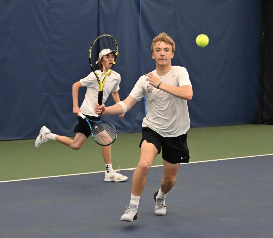 Lexington's Karl Etzel (front) and Owan Gongwer finished as sectional doubles runners-up.