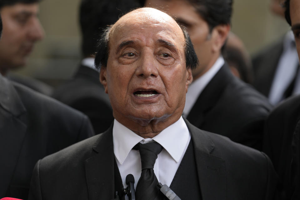 Latif Khosa, center, a lawyer of Pakistan's former Prime Minister Imran Khan's legal team, speaks with media outside a court after Khan's appeal hearing, in Islamabad, Pakistan, Wednesday, Aug. 9, 2023. A top Pakistani court Wednesday said it wanted to hear from the government before deciding over the imprisonment of former Prime Minister Imran Khan on corruption charges. Khan was arrested at his Lahore home on Saturday and given a three-year jail sentence on charges of concealing assets. He is held at the high-security prison Attock while his legal team seeks his release. (AP Photo/Anjum Naveed)
