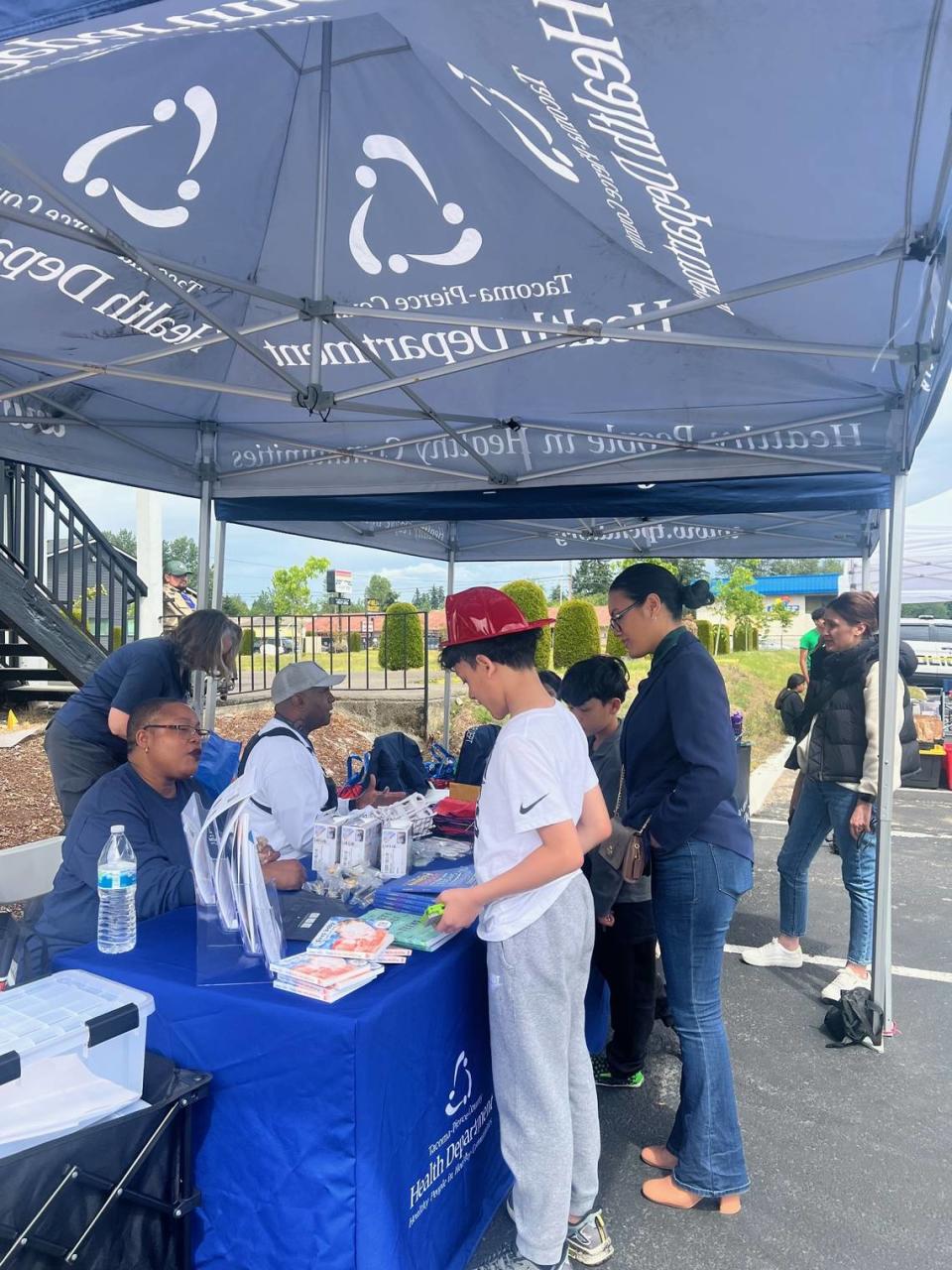 Tacoma-Pierce County Health Department was among the participants with a booth at the Healthy Hosmer Initiative event June 1 at Sage’s Cascade Ridge property. Andrea Haug/SENCO