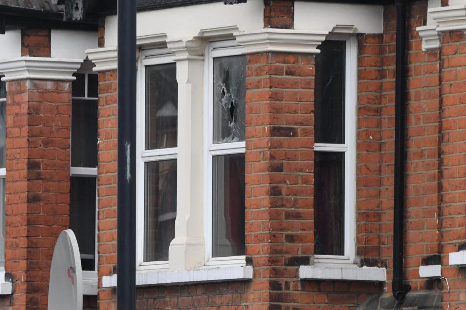 Shooting: Bullet holes in windows on the street (Jeremy Selwyn)