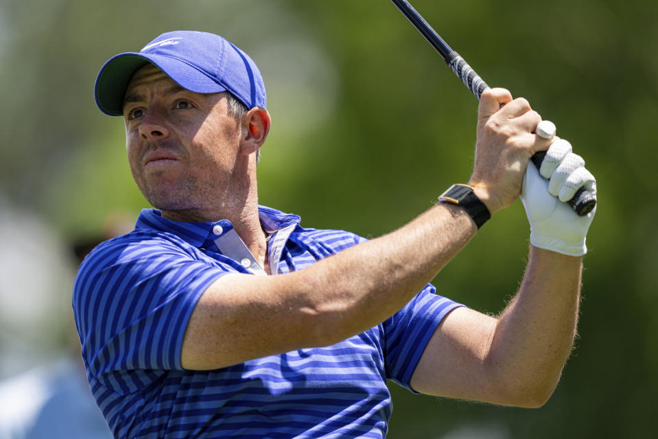 Rory McIlroy watches his tee shot on the third hole during the first round of the Wells Fargo Championship golf tournament at Quail Hollow Club on Thursday, May 6, 2021, in Charlotte, N.C. (AP Photo/Jacob Kupferman)