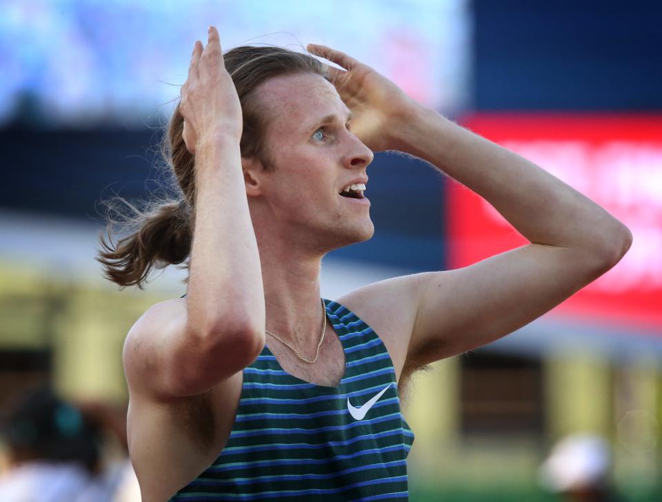 Former Oregon runner Cole Hocker looks at the results on the screen in frustration after finishing sixth in his heat and failing to advance in the men's 1,500 meters on day one of the USA Track and Field Championships 2022 at Hayward Field in Eugene Thursday June 23, 2022.