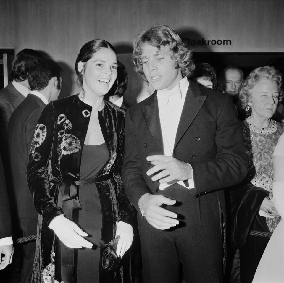 Ali MacGraw and Ryan O'Neal at the premiere of Love Story at the Odeon Leicester Square, London, on 8 March 1971 (Getty)