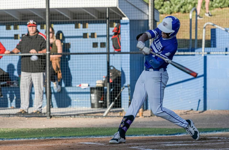 MDCA’s Dallas Dale hits a home run in Wednesday's Class 2A-Region 2 quarterfinal game Lakeland Victory Christian Academy in Mount Dora. [PAUL RYAN / CORRESPONDENT]