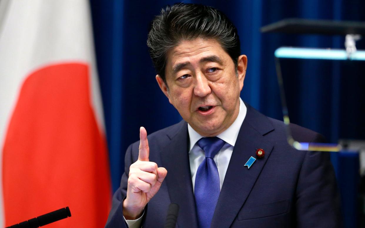 Prime Minister Abe announced Monday he will call a snap election for parliament's more powerful lower house for next month - AP