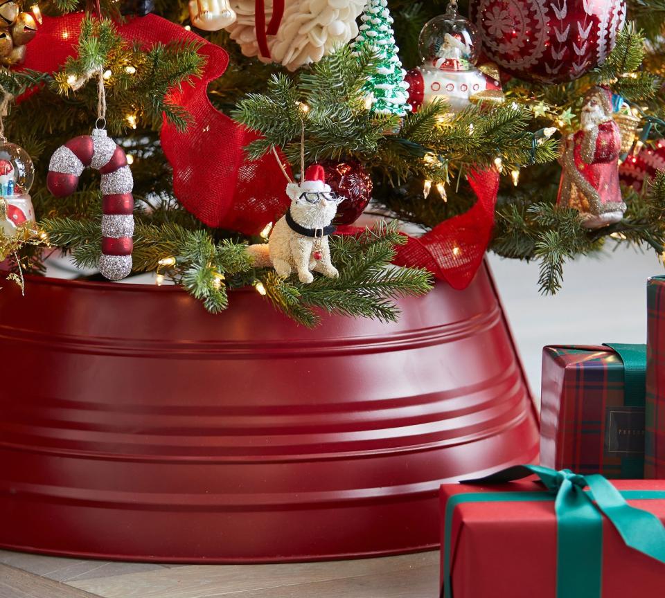<p><a href="https://go.redirectingat.com?id=74968X1596630&url=https%3A%2F%2Fwww.potterybarn.com%2Fproducts%2Fred-metal-christmas-tree-collar&sref=https%3A%2F%2Fwww.housebeautiful.com%2Fentertaining%2Fholidays-celebrations%2Fg45547699%2Fbest-christmas-tree-stands%2F" rel="nofollow noopener" target="_blank" data-ylk="slk:Shop Now;elm:context_link;itc:0;sec:content-canvas" class="link ">Shop Now</a></p><p>Handcrafted Red Metal Tree Collar</p><p>potterybarn.com</p><p>$69.00</p>