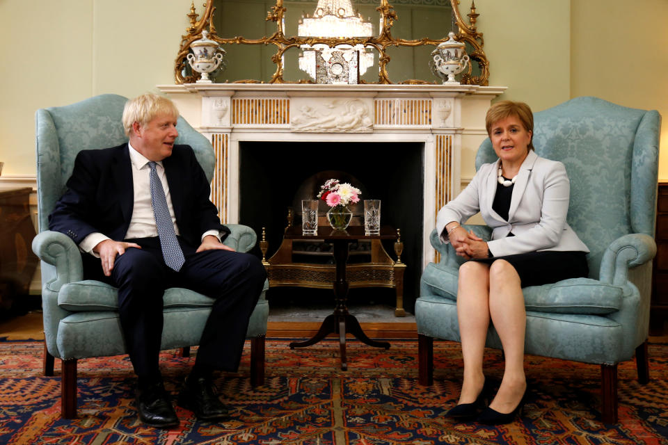 Britain's Prime Minister Boris Johnson poses for a photograph with Scotland's First Minister Nicola Sturgeon at Bute House in Edinburgh, Britain, July 29, 2019. Duncan McGlynn/Pool via REUTERS