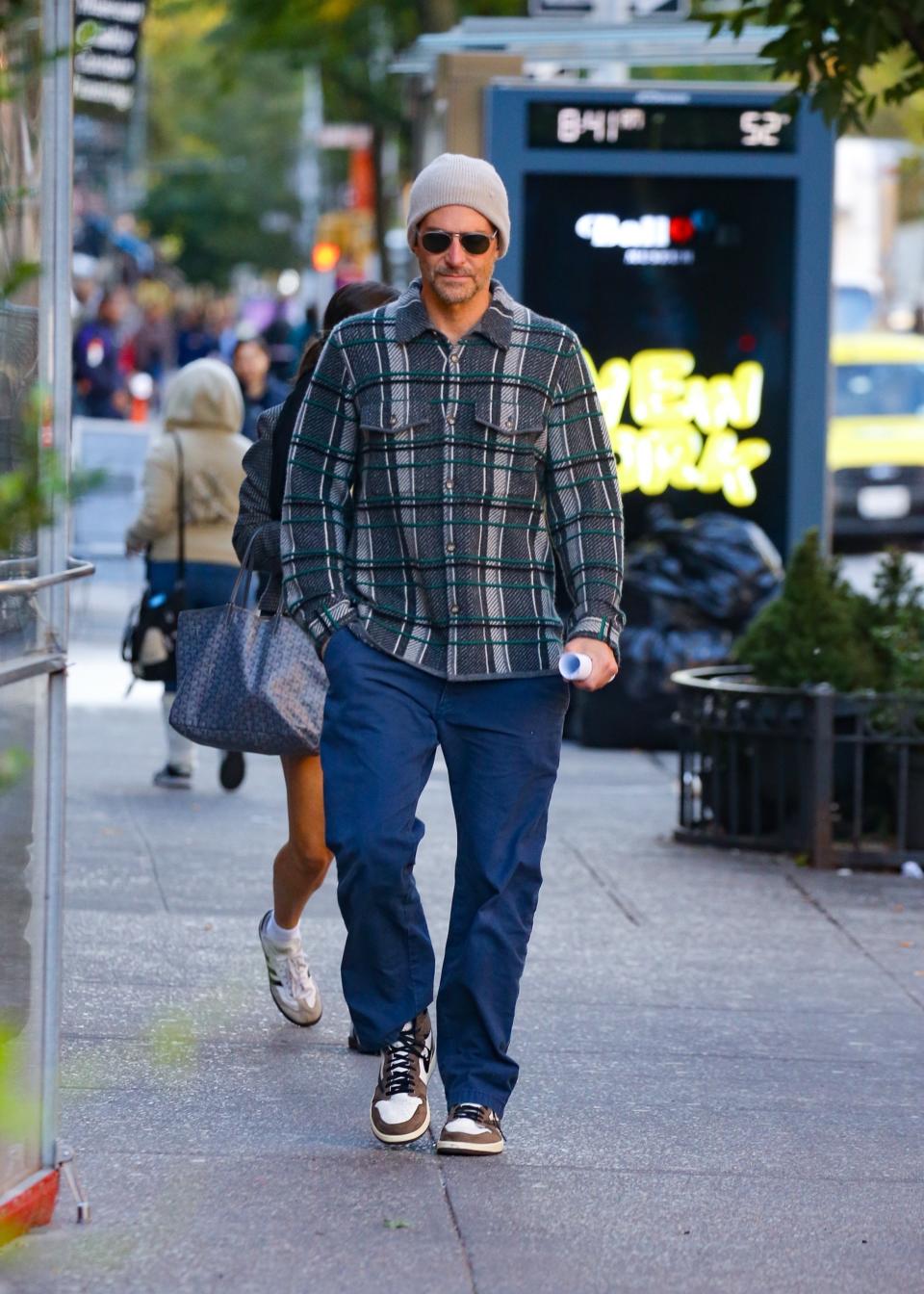 <h1 class="title">Bradley Cooper spotted enjoying a casual stroll in NYC!</h1><cite class="credit">REES, ULRA</cite>