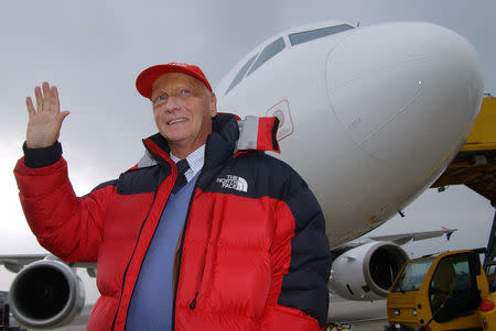 FILE PHOTO: Former Formula One World Champion Niki Lauda poses for photographers in front of an airbus A320 at Vienna's Airport, Austria November 28, 2003. REUTERS/Heinz-Peter Bader/File Photo