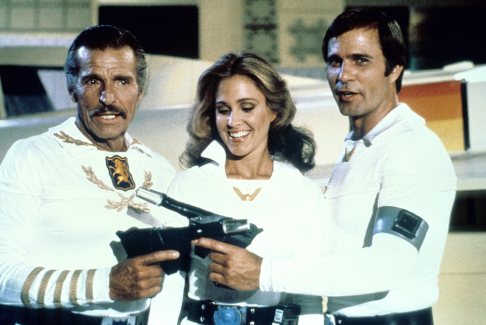 BUCK ROGERS IN THE 25TH CENTURY, Larry 'Buster'Crabbe, Erin Gray, Gil Gerard in 'Planet of the Slave Girls: Parts 1 and 2' (Season 1, Episodes 3 and 4, aired September 27, 1979), 1979-81. ©Universal Television/courtesy Everett Collection