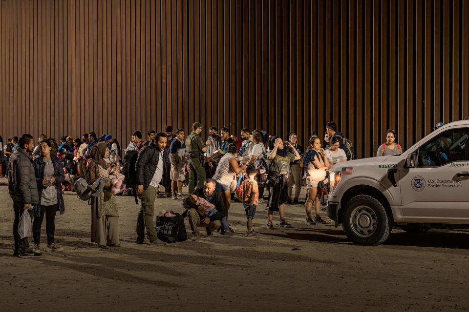 Immigrants are processed by the U.S. Border Patrol after crossing the border from Mexico on August 20, 2022 in Yuma, Arizona. / Credit: Qian Weizhong/VCG via Getty Images