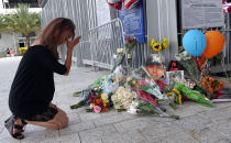 <p>Junko Sasaki of Japan cries at a memorial for Jose Fernandez at Marlins Park in Miami after the game against the Atlanta Braves was canceled because of the death of pitcher Jose Fernandez, Sunday, Sept. 25, 2016, in Miami Beach. (Joe Cavaretta/South Florida Sun-Sentinel via AP) </p>