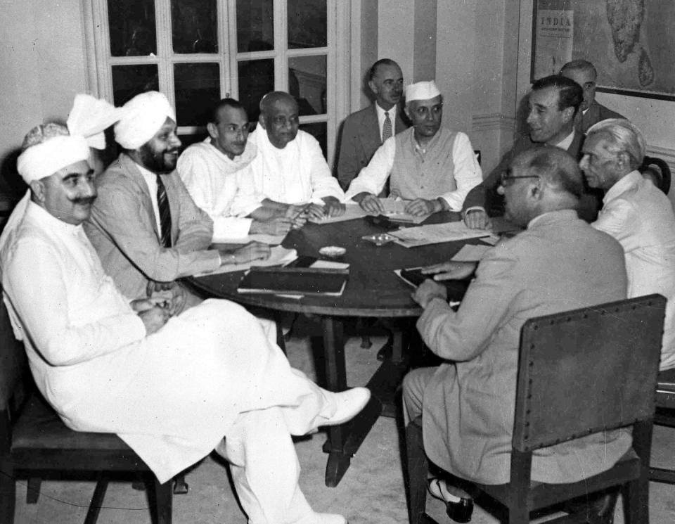 Lord Louis Mountbatten, viceroy of India, discusses Britain's partition plan with Hindu and Muslim leaders in the summer of 1947. <a href="https://newsroom.ap.org/detail/IndiaRoundTableConference/0fbd8f0a7e2244d4b293d992e37517e8/photo?Query=mountbatten%20nehru%20jinnah&mediaType=photo&sortBy=&dateRange=Anytime&totalCount=3&currentItemNo=0" rel="nofollow noopener" target="_blank" data-ylk="slk:AP Photo/Max Desfor;elm:context_link;itc:0" class="link ">AP Photo/Max Desfor</a>