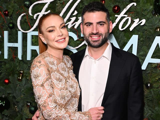<p>Bryan Bedder/Getty</p> Lindsay Lohan and Bader Shammas at Netflix's Falling For Christmas Celebratory Holiday Fan Screening with Cast & Crew on November 9, 2022 in New York City.