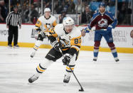 Pittsburgh Penguins center Sidney Crosby drives to the net to score a goal against the Colorado Avalanche in the second period of an NHL hockey game Wednesday, March 22, 2023, in Denver. (AP Photo/David Zalubowski)