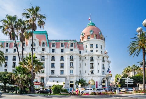The landmark palace hotel on the Promenade des Anglais - Credit: GETTY