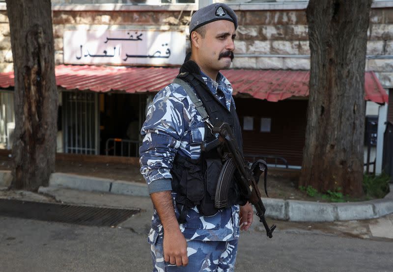 A Lebanese police stands outside the Justice Palace in Beirut