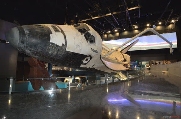 — Space shuttle Atlantis is presented "in flight" inside its new $100 million display at NASA's Kennedy Space Center Visitor Complex in Florida. Atlantis' exhibit is set to open June 29, 2013.