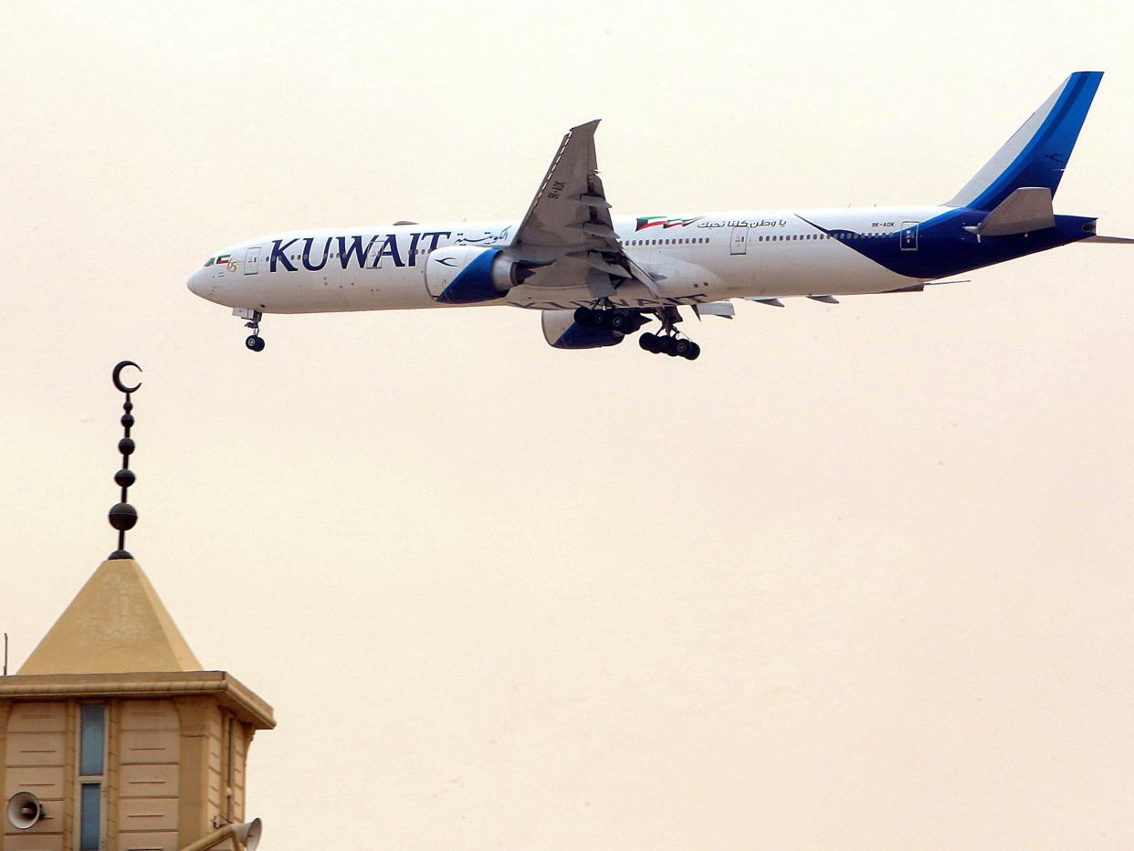 A Kuwait Airways aircraft prepares to land in Kuwait City