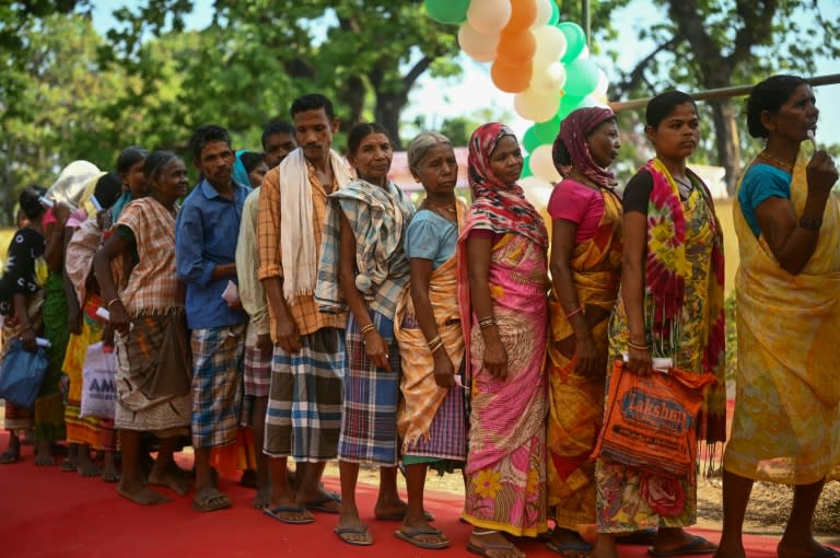 People queue to vote in a village in Bastar district, one of the last strongholds of the Naxal rebels (Idrees MOHAMMED)