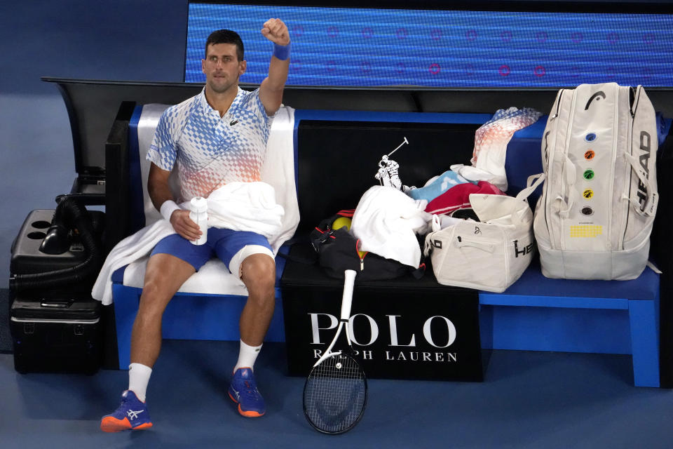 Novak Djokovic of Serbia gestures to supporters after winning the first set against Tommy Paul of the U.S. during their semifinal at the Australian Open tennis championship in Melbourne, Australia, Friday, Jan. 27, 2023. (AP Photo/Ng Han Guan)