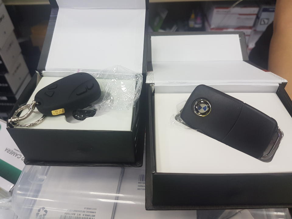 One can buy a spy camera hidden within a fake car key. A plain car key costs $30 while a BMW car key costs slightly more. (PHOTO: Wan Ting Koh/Yahoo News Singapore)