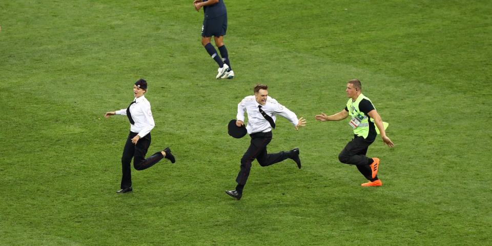 world cup fans rush field